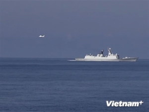 China uses six military ships to protect rig